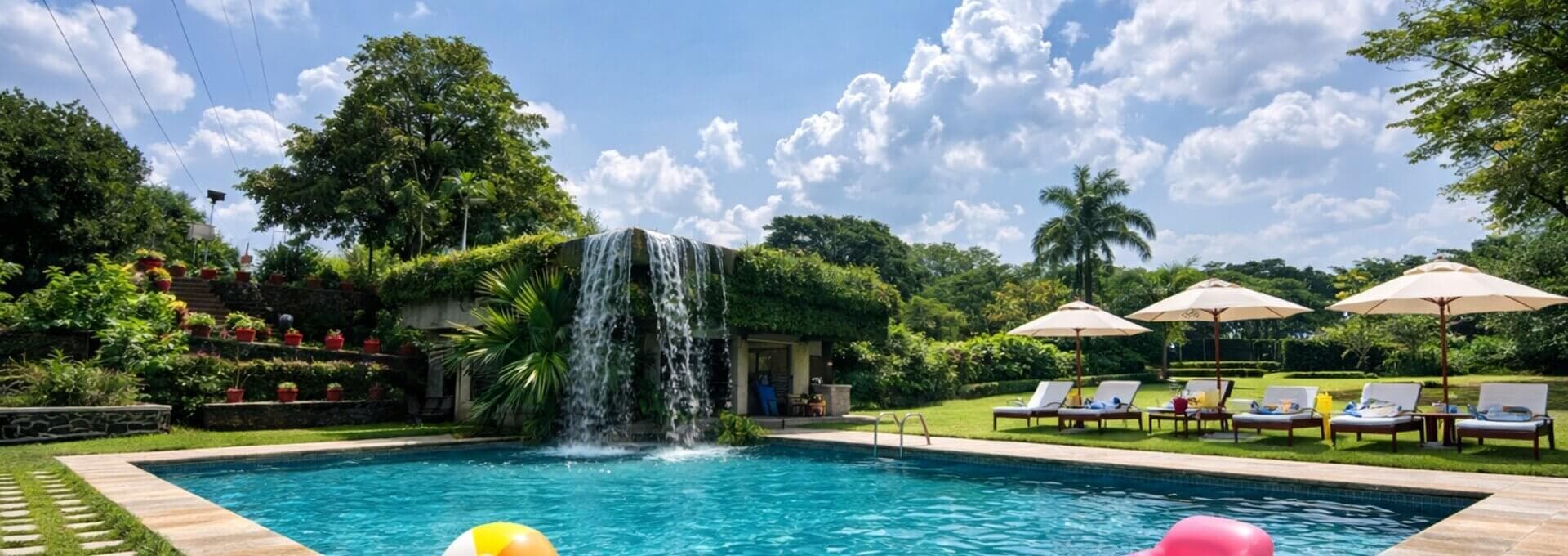 Infinity pool with 20-ft waterfall at Manas Resort