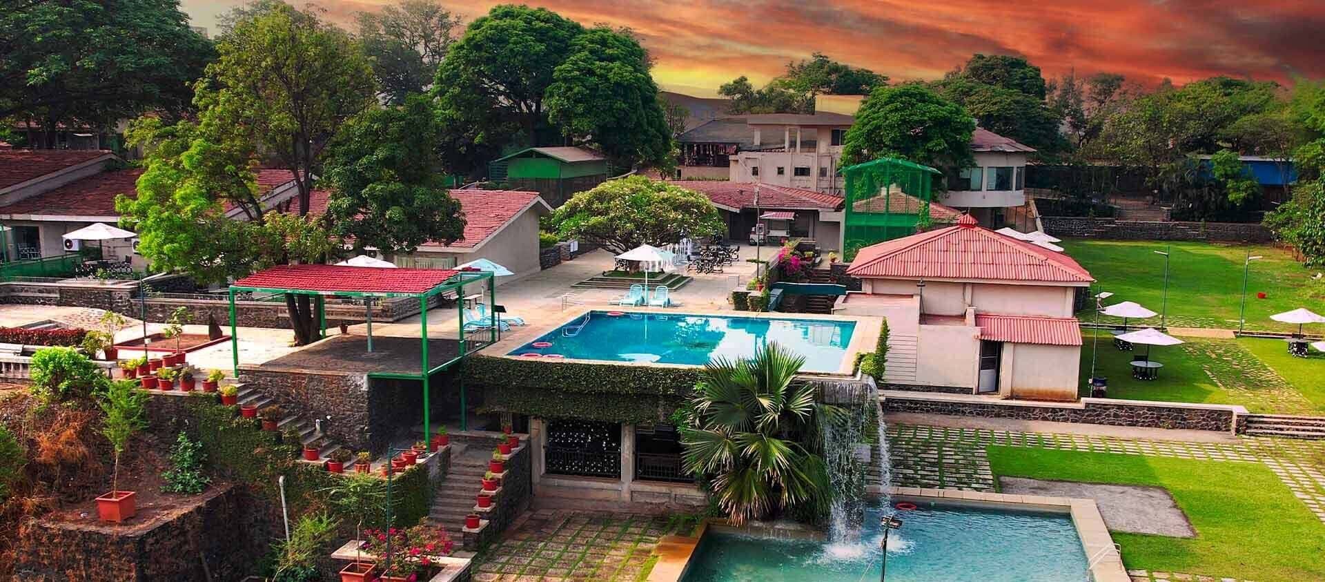 Infinity pool at Manas Resort — weekend getaway from Mumbai